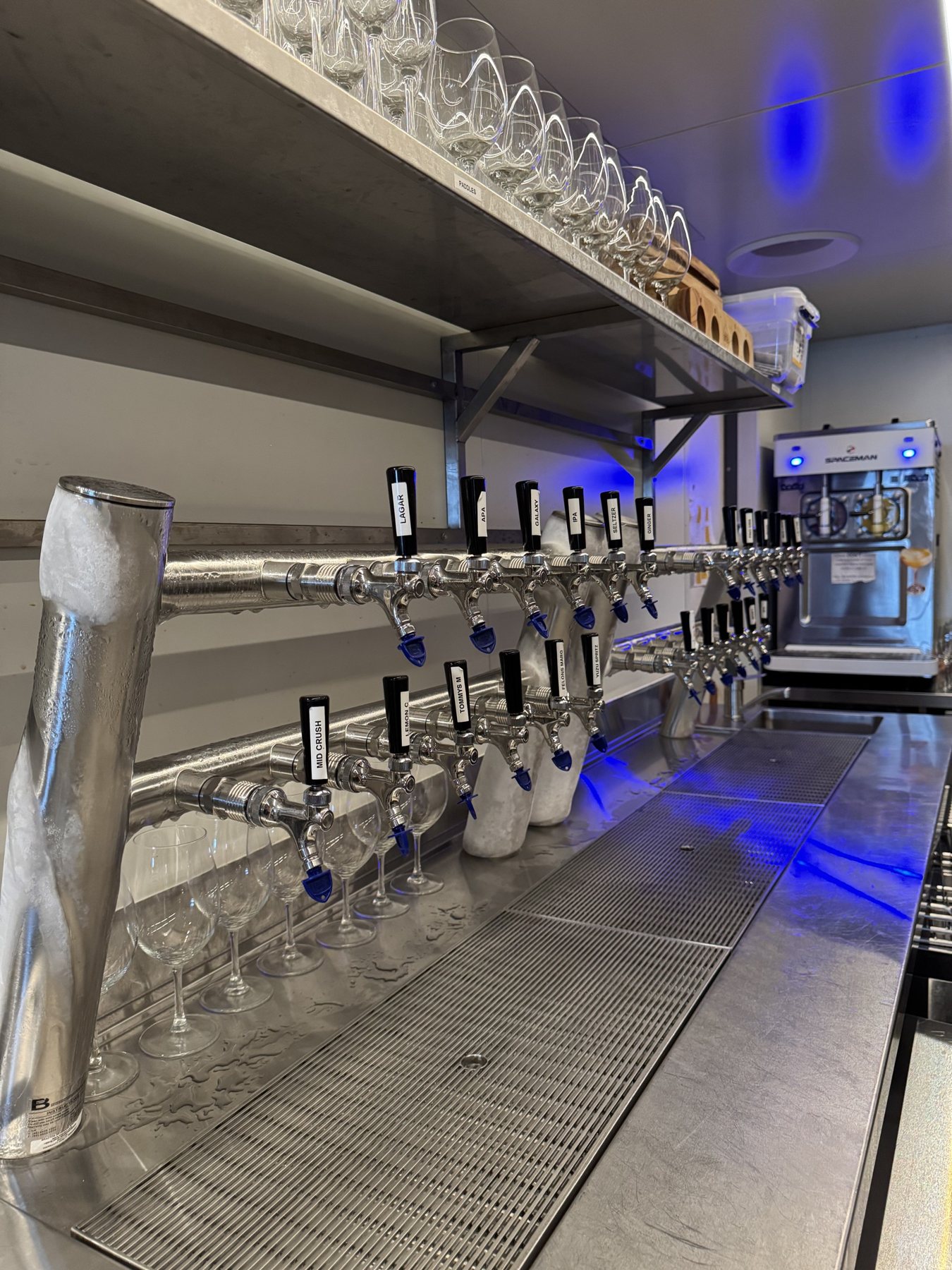 Row of beer taps with chilled fonts